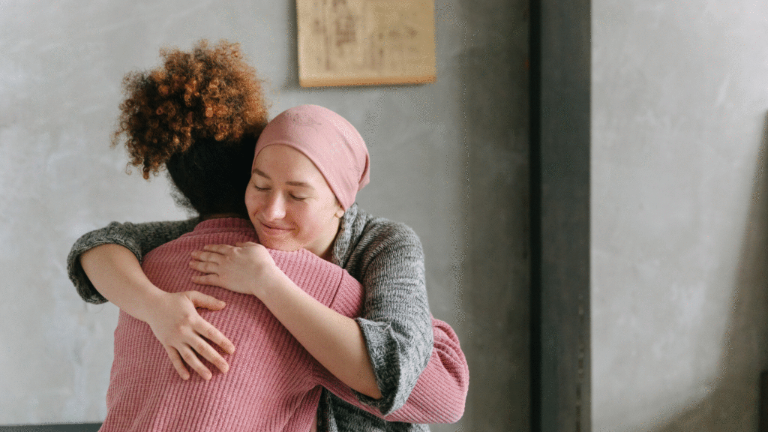 woman in remission hugs her friend