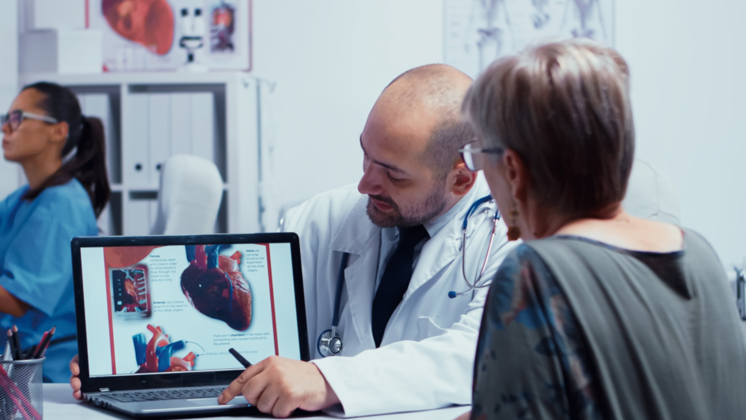 doctor review cardiology results with patient