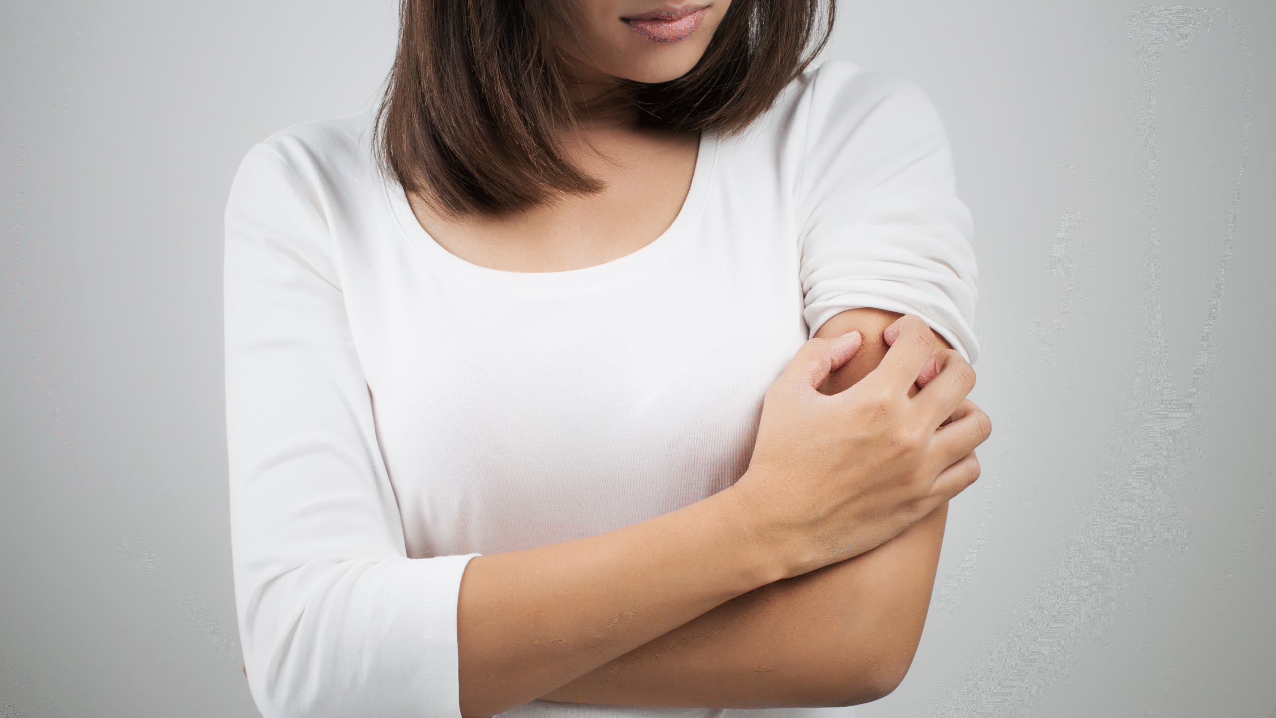 lady with itchy bite on skin